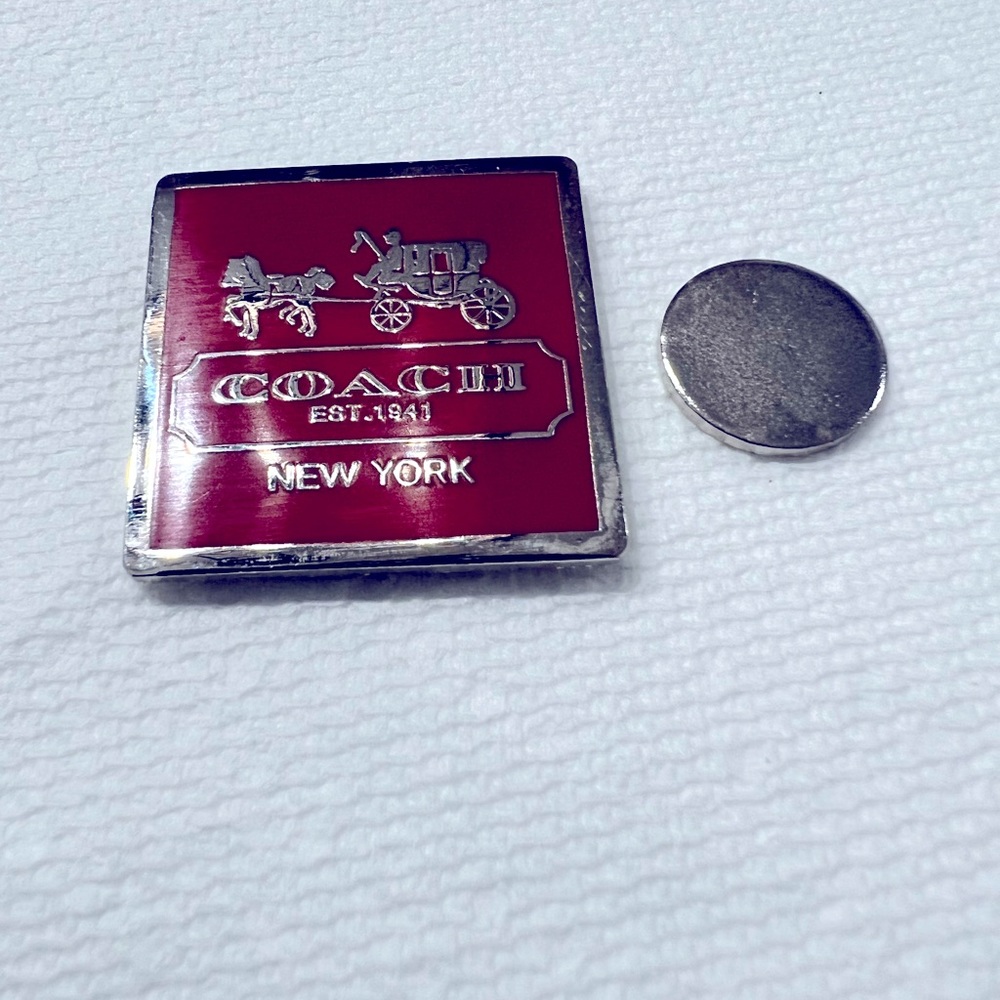 Authentic Coach magnetic pin, very good condition.